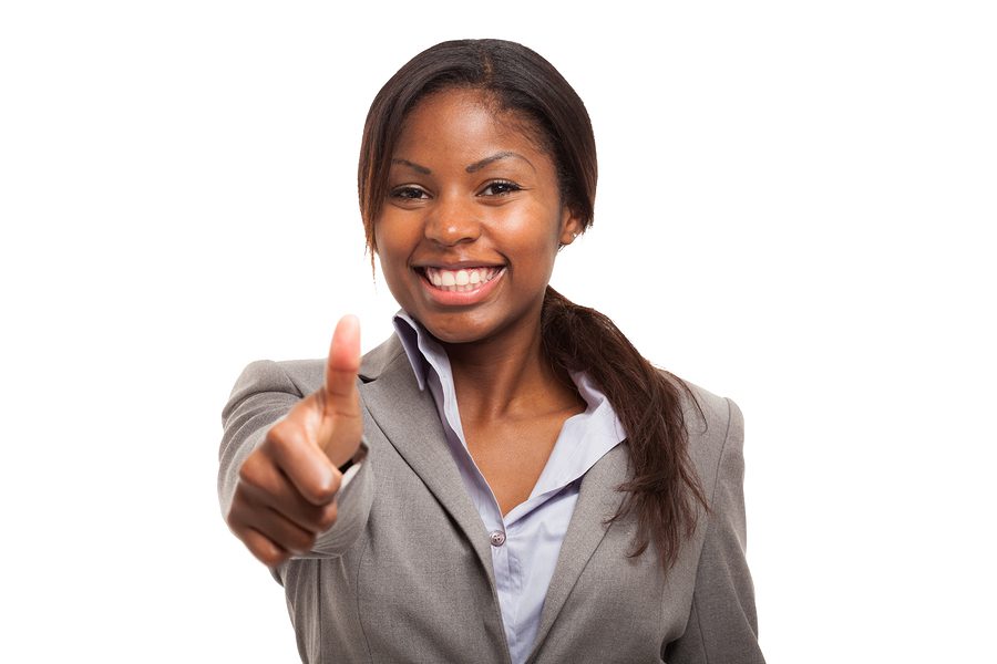 Business woman showing thumbs up